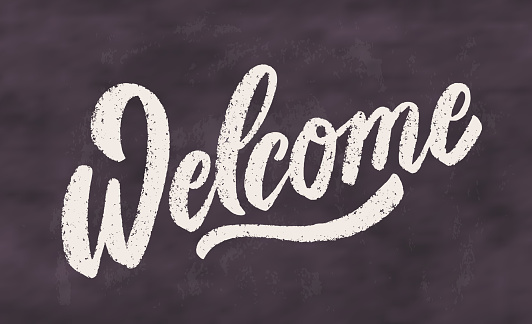 Welcome. Chalkboard vector handwritten lettering sign.