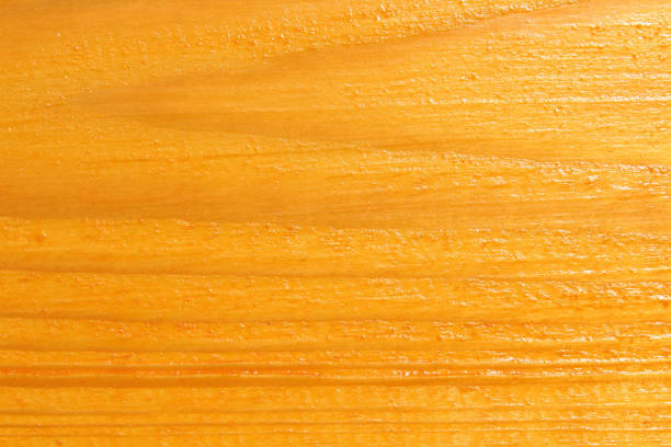 istock Wooden surface of pine covered with a protective layer. Beam close-up. Background. Texture. 1360675731