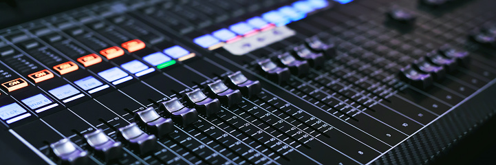 Recording Studio Mixing Desk with Music Producer on the concert stage