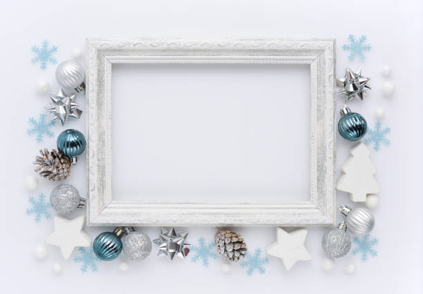 istock Christmas composition. Photo frame, christmas decorations on white background. Flat lay, top view, copy space 1360676727