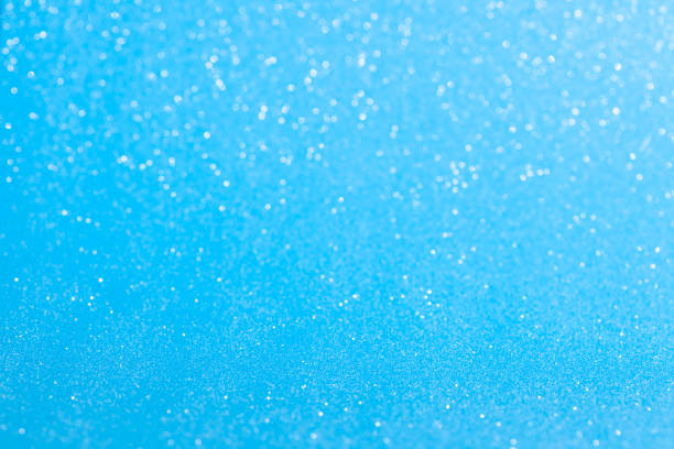 istock sparkles of Blue glitter abstract background. Copy space 1360678601