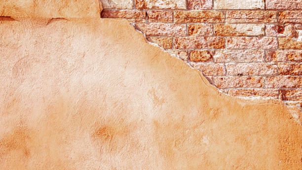 istock Old wall texture. Vintage grunge plaster or concrete stucco surface. Old rough stone on cement pattern wall background. Montage product design concept. 1360680943