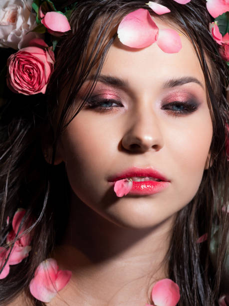 istock Beautiful blue-eyed brunette with bright pink makeup, 1360686309