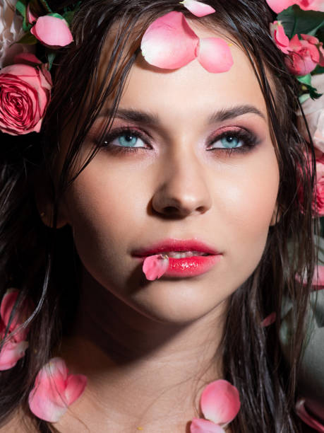istock Beautiful blue-eyed brunette with bright pink makeup, 1360686310