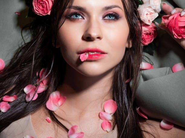istock Beautiful blue-eyed brunette with bright pink makeup, 1360686314