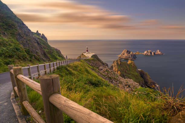 Panoramic view of thr lighthouse of Cabo Ortegal in Galicia, Spain. Panoramic view of the lighthouse of Cabo Ortegal in Galicia, Spain. Long Exposure. headland stock pictures, royalty-free photos & images