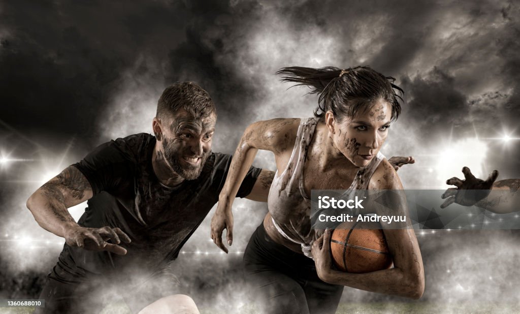 Handsome woman rugby player Handsome woman rugby player. Rugby woman player holds ball Rugby - Sport Stock Photo