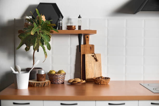 istock kitchen countertop close up with kitchen utensils items on it 1360688026