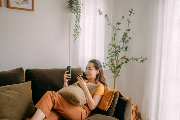 istock Young woman Using credit card payment 1360690294