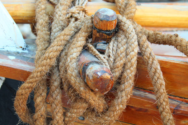 istock Rope on a wooden boat close-up. Background. 1360690904