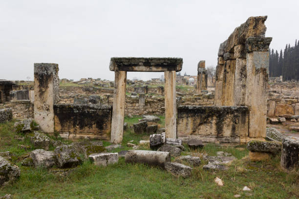 istock Ancient City Hierapolis Ruins in Pamukkale, Standing columns and stone structures 1360691973