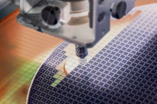 istock silicon wafer in die attach machine in semiconductor manufacturing 1360692285