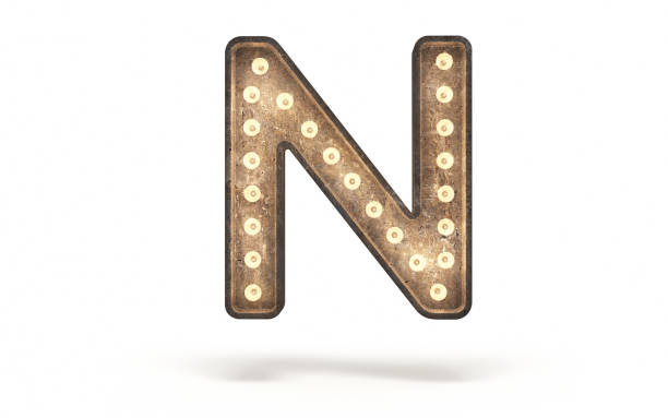 istock Letter N decorated with light bulb covered with concrete 1360697163