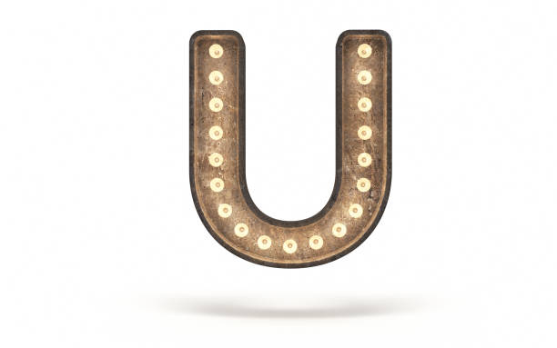 istock Letter U decorated with light bulb covered with concrete 1360697193