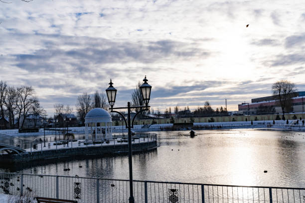 istock Snow covered city garden 1360698196