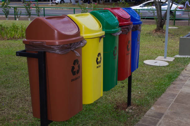 istock Trash cans in different colors for recycling waste 1360698371