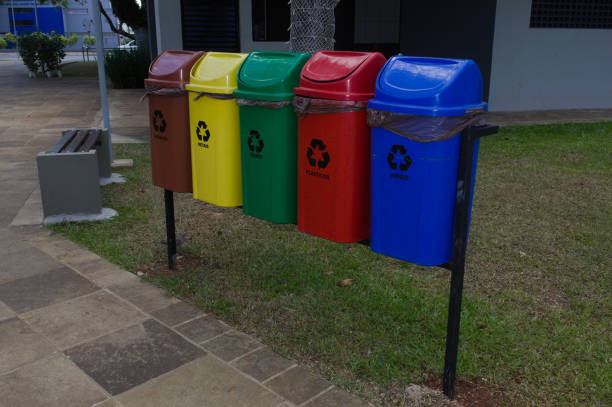 istock Trash cans in different colors for recycling waste 1360698373