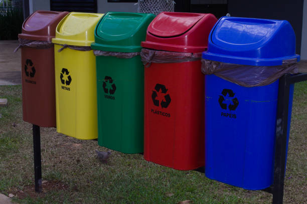 istock Trash cans in different colors for recycling waste 1360698384