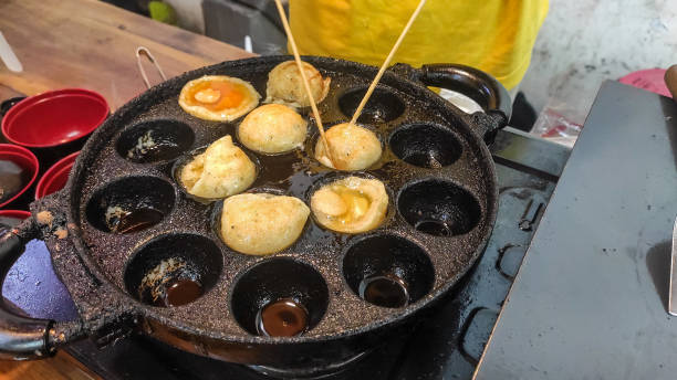 takoyaki fatto in casa - cooked in a row traditional culture indoors foto e immagini stock