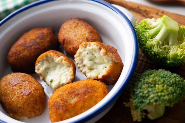 istock Broccoli and cheese croquettes. Traditional Spanish tapa. 1360700525