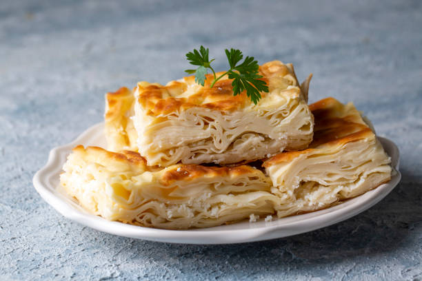 istock Delicious Turkish food; Tray pastry; (Turkish name; Su boregi) 1360701765