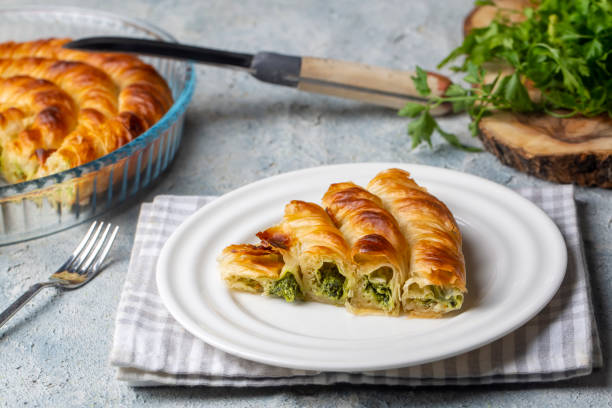 istock Turkish Tepsi Boregi, Round Borek, Tray pastry (Turkish name; rulo borek) 1360702444