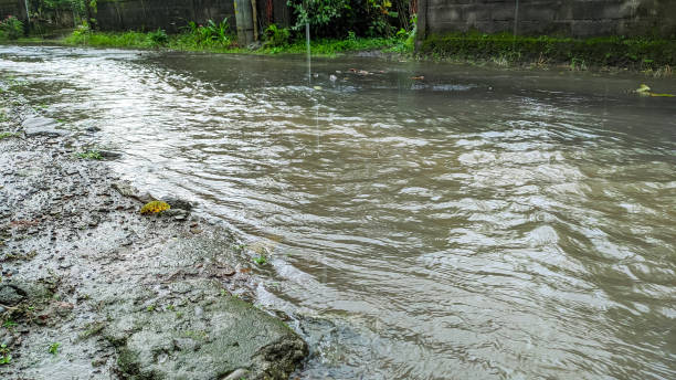 istock Road flooded with rain 1360705350