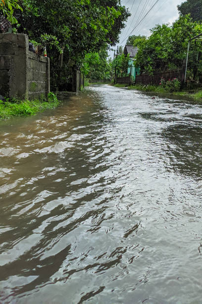 istock Road flooded with rain 1360705351