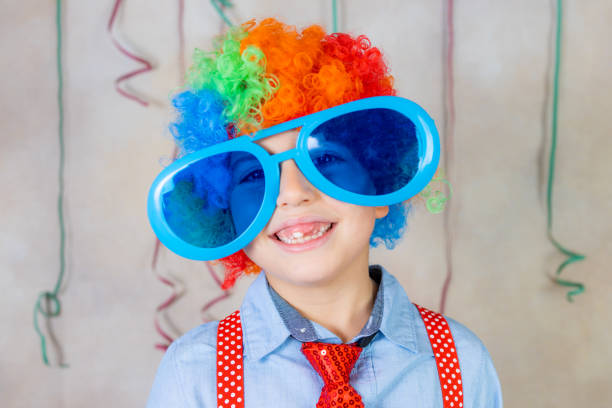 funny kid with big glasses at carnival - entertainment clown child circus imagens e fotografias de stock