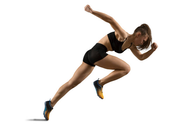 istock Woman sprinter leaving starting on the athletic track 1360708238