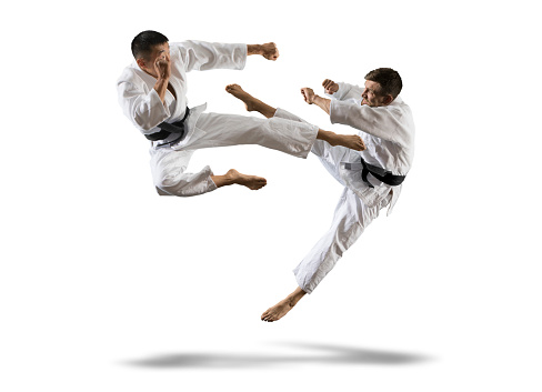 Martial arts masters, karate practice. Isolated background