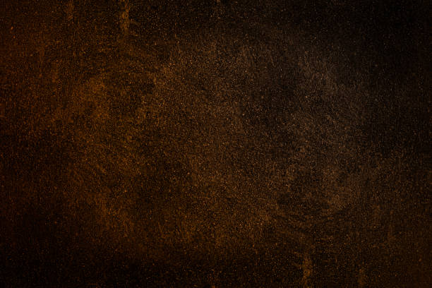 istock Rough texture background of brown color concrete plaster wall 1360710577