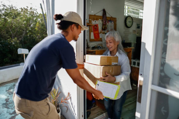 istock grandmother received courier packages at Christmas 1360718200