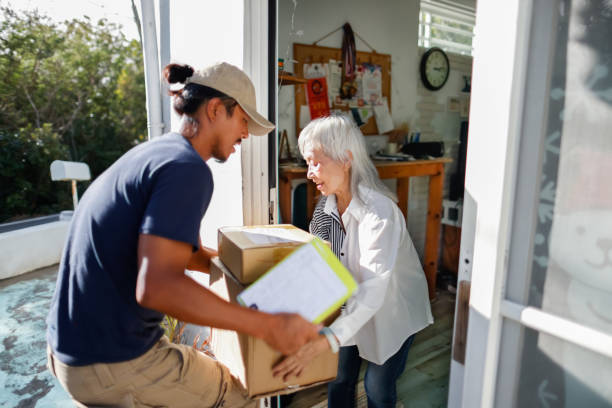 istock grandmother received courier packages at Christmas 1360718216