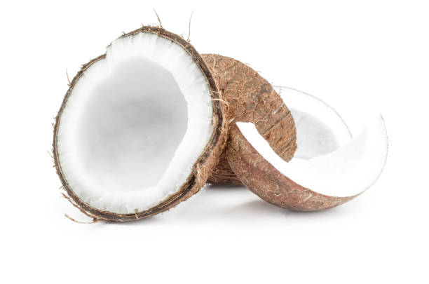 istock Chopped coconut close-up isolated on white background 1360718355