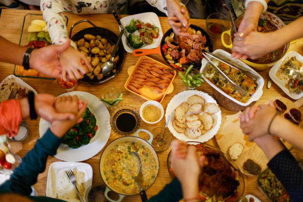 istock Pray with family at Christmas 1360719373