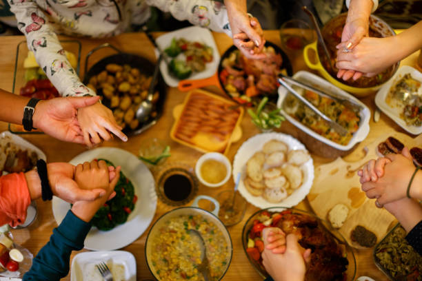 istock Pray with family at Christmas 1360719388