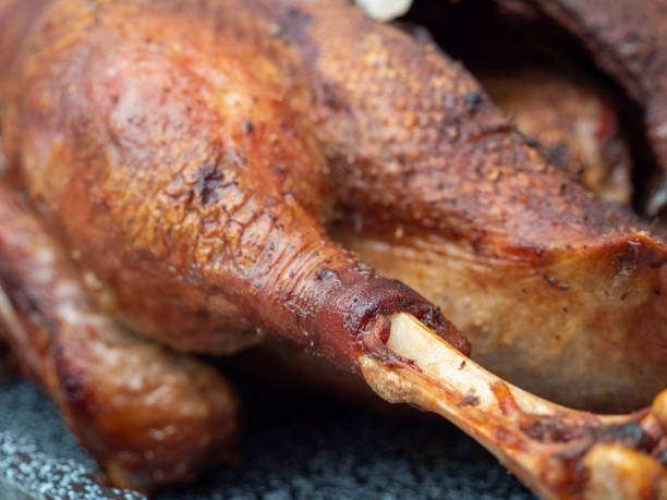 istock Close up of roast goose with blurred background 1360727523