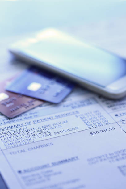 istock Credit Cards On A Hospital Invoice 1360728765