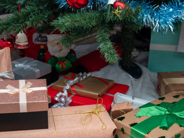 istock Christmas gifts under the tree 1360729906