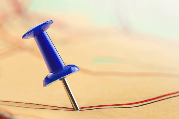 istock Location marking with pin on map. Travel and journey concept. 1360735388