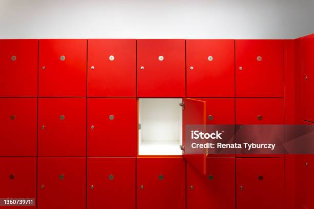 Deposit Red Locker Boxes Or Gym Lockers Inside Of A Room With One Central Opened Door Stock Photo - Download Image Now