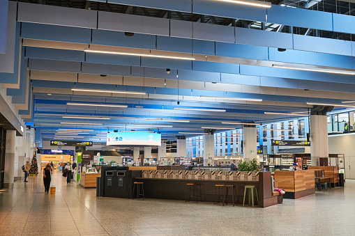 Melbourne, Australia - 8 Dec 2021: Melbourne Airport departure/arrival hall in Dec 2021. Not many people is in the hall.