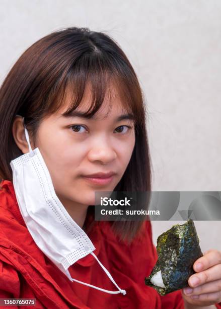 Young Woman Eating With Mask New Normal In Covi19 Stock Photo - Download Image Now