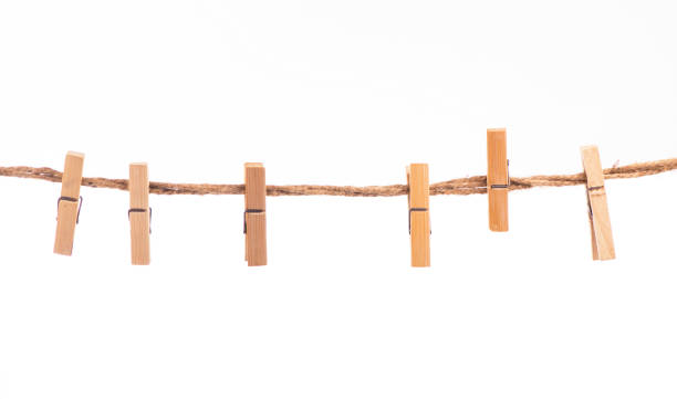 istock Clothespins with the rope on a white background 1360769423