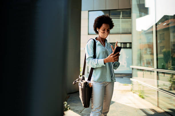 istock Business woman using a cell phone for a video call 1360785913