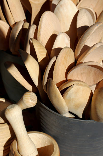 istock wooden spoons on a wooden background 1360786024