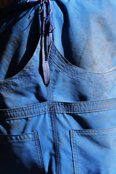 istock close-up blue jeans dirty apron detail 1360786638