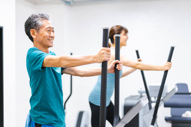 istock Active seniors exercising at the gym 1360797873