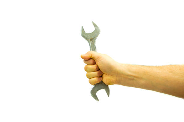 istock Repairing work spanner wrench tool in human hand 1360800536